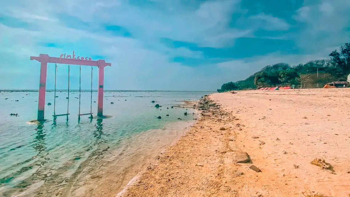 Hacerse una foto en sus famosos columpios​